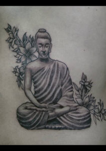 buda y flores tattoo