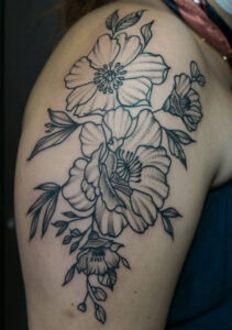 flores linea tattoo